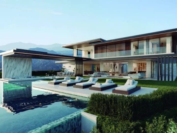 Franquicia inmobiliaria en España con villa de lujo moderna, piscina infinita y diseño arquitectónico contemporáneo con vistas panorámicas