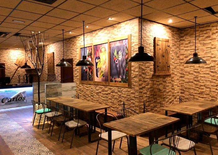 nueva apertura pizzeria carlos