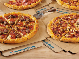Dos pizzas de la franquicia Domino´s Pizza